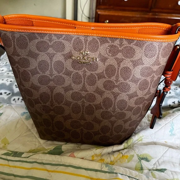 Coach Signature Canvas and Bright Mandarin City Bucket Bag - Picture 2 of 16